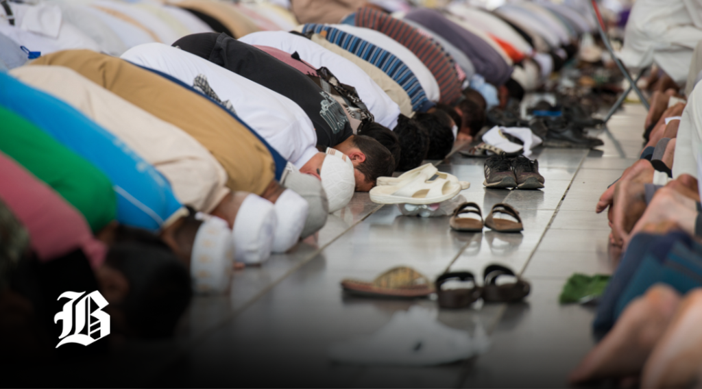 Worshipers praying in a mosque