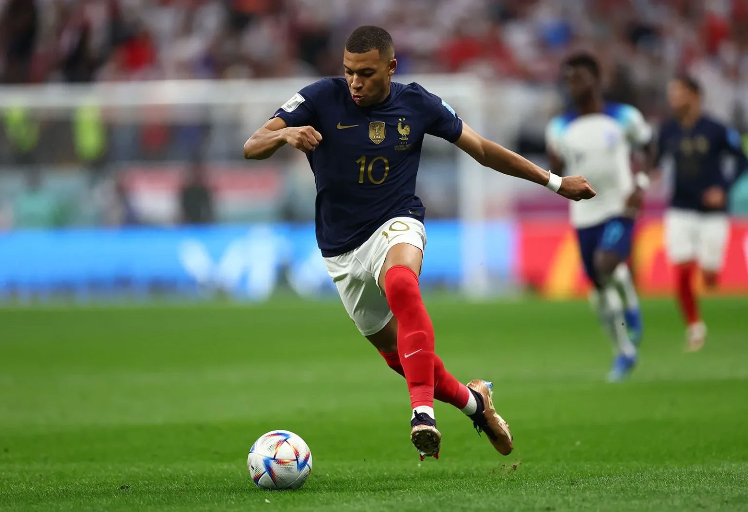 French football star Kylian Mbappe on the pitch